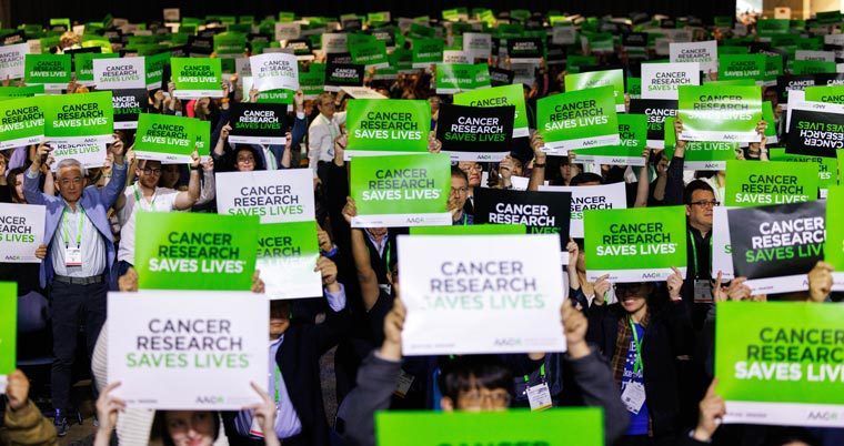 Opening session of #AACR25 annual meeting - with all attendees raising signs in support of cancer research funding #CancerResearchSavesLives