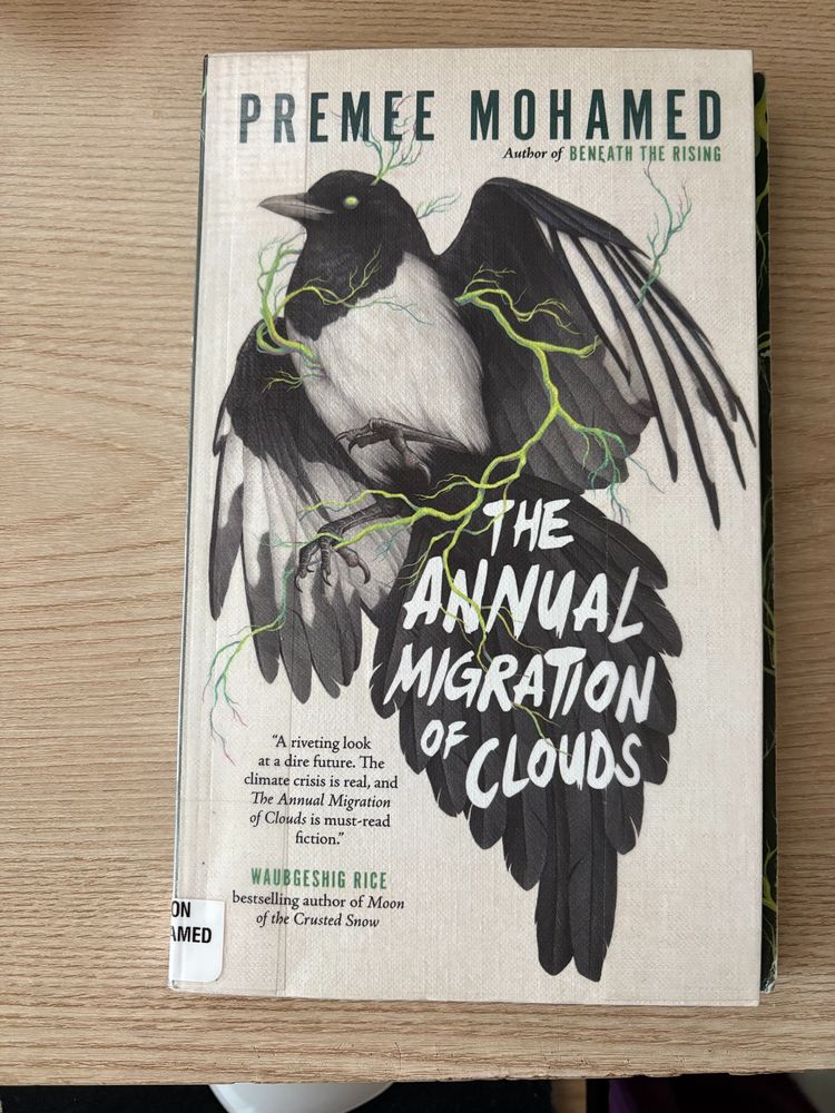 Book cover of Premee Mohamed's "The Annual Migration of Clouds" 