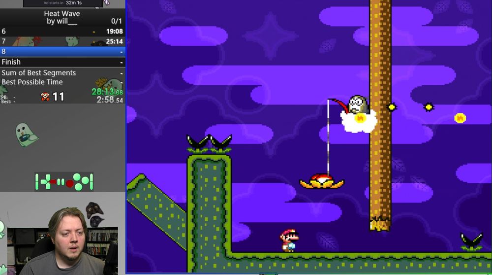 Super Mario World Fishin' Boo carrying a Volcano Lotus.