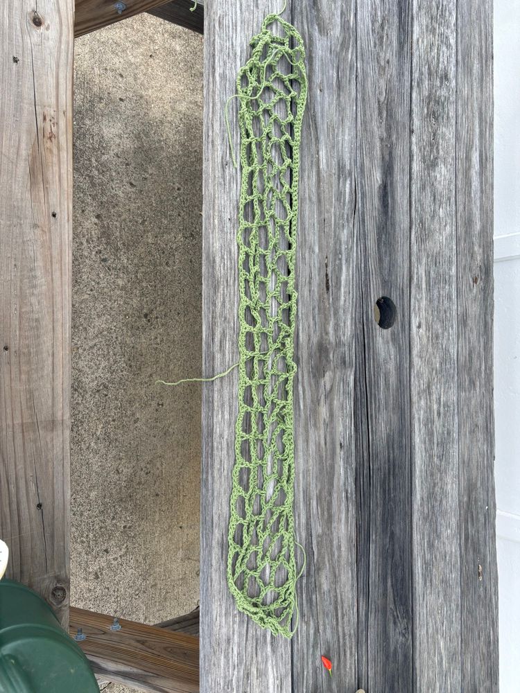 A crocheted green net