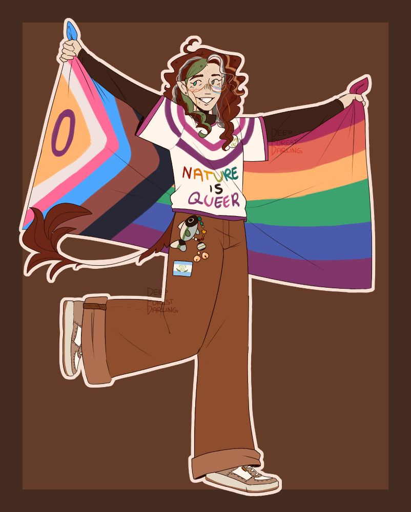 A drawing of me! I am standing against a brown background, i am holding a progress pride flag behind me and looking to the side. I am wearing a shirt with the queer flag that says "NATURE IS QUEER", on my hip is a fish made from the demiromantic flag and a little beaded chain that ends with an agender pin and two bells. On my leg is the achillean flag and on my cheek is a trans flag.