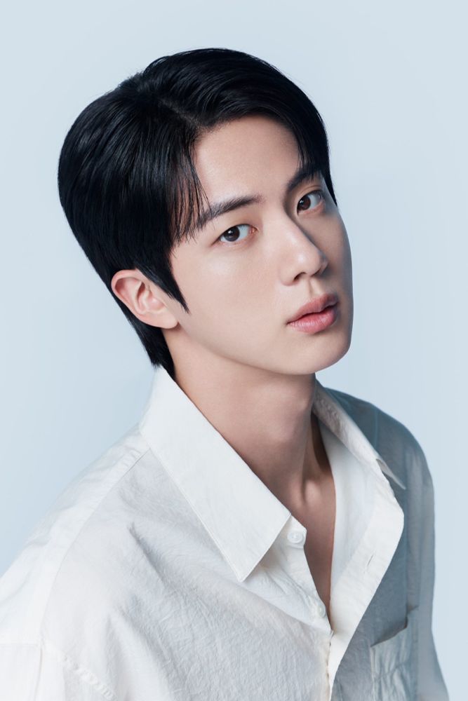 Seokjin in plan white shirt with the top buttons undone