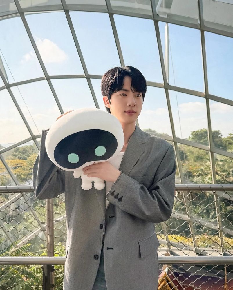 Wootteo held by Seokjin at the Cloud Forest