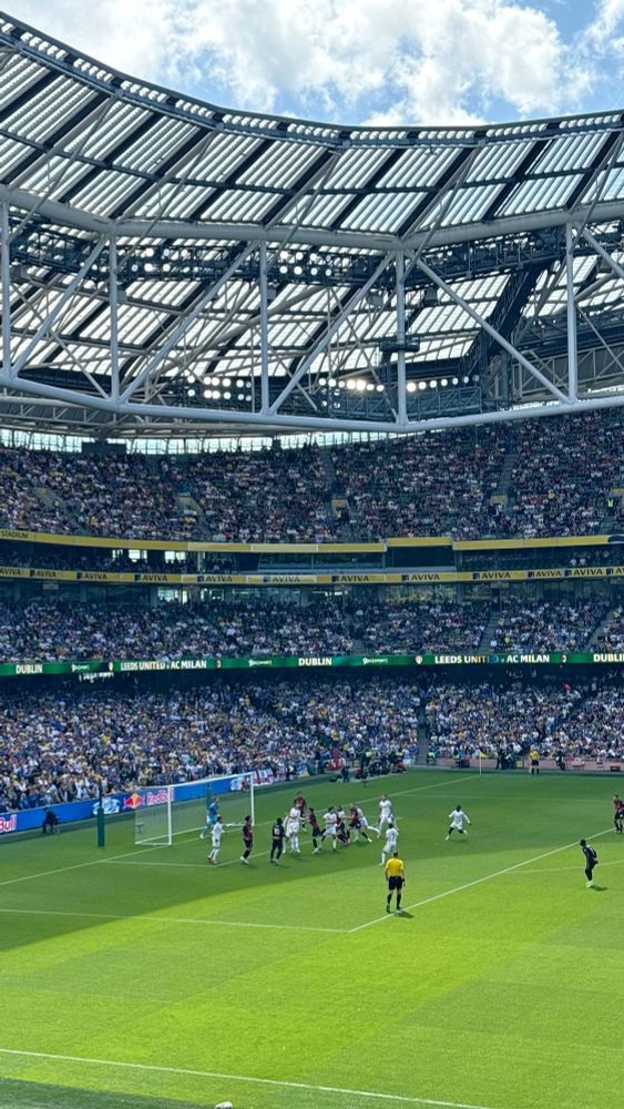 Leeds United and AC Milan contest a corner in a friendly match at Aviva Stadium, Dublin 