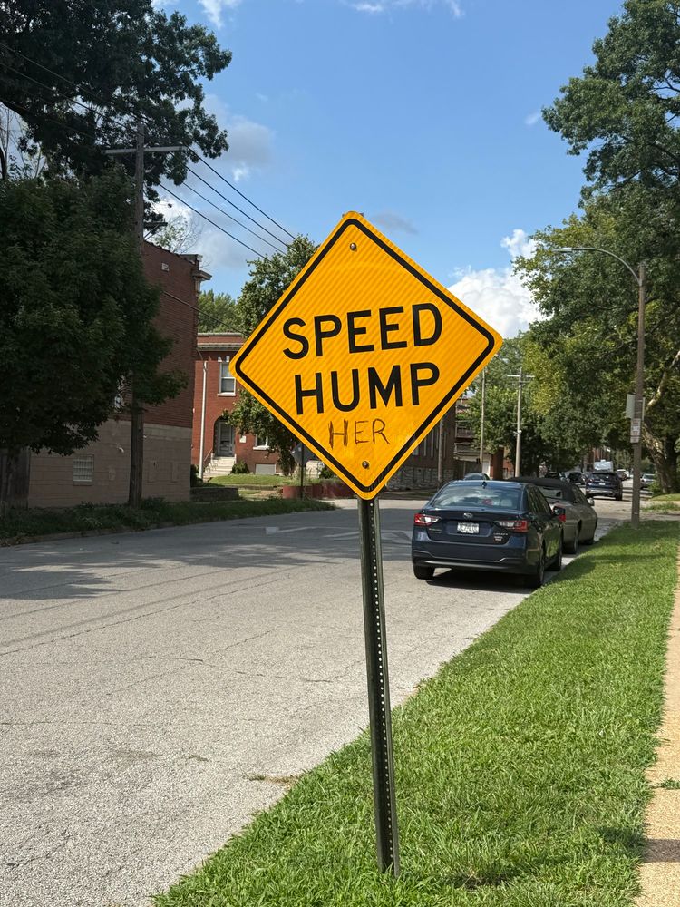 A “Speed Hump” sign defaced to read “Speed Hump Her”
