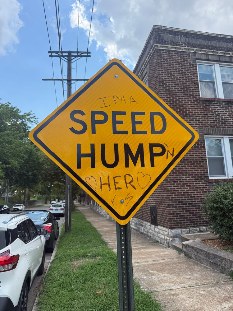 A “Speed Hump” sign defaced to read “ima speed hump’n her”