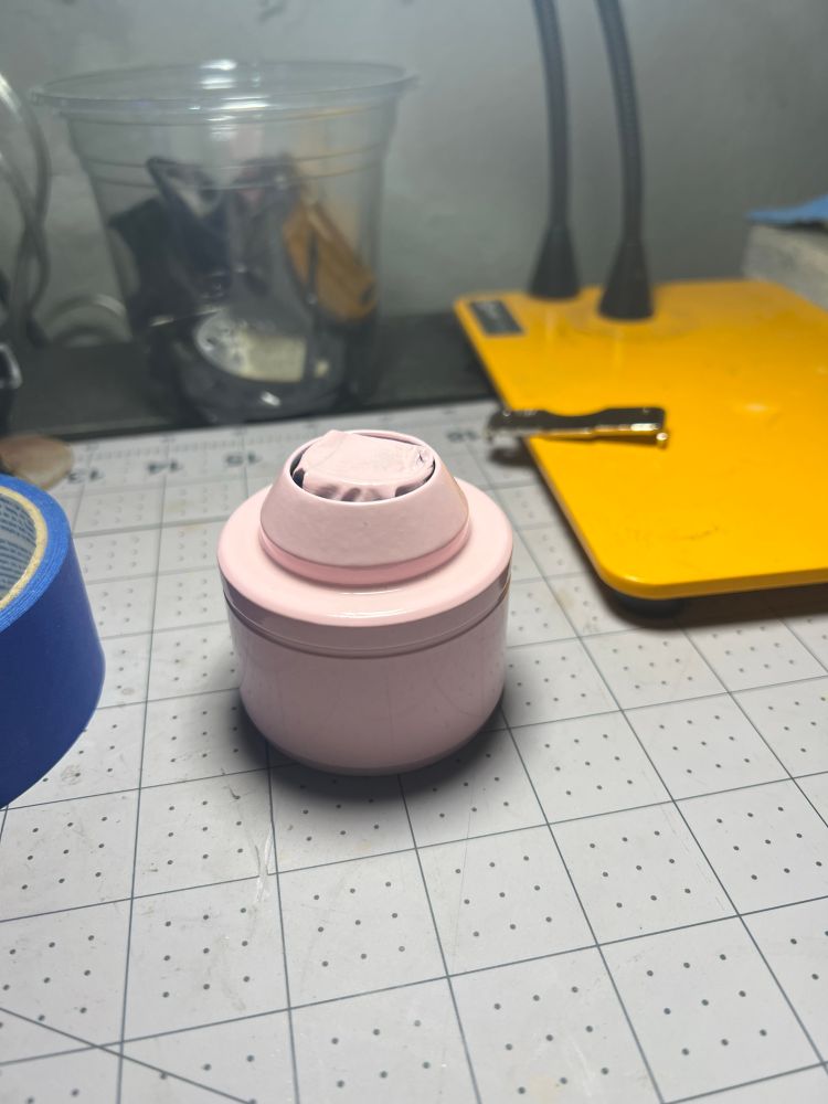 the lower body of an MXL 990, painted a high-gloss pink. it’s several layers deep, with again several layers of high-gloss clear coat on top. after this has had several days to fully cure i’ll be able to experiment with durability a little bit.