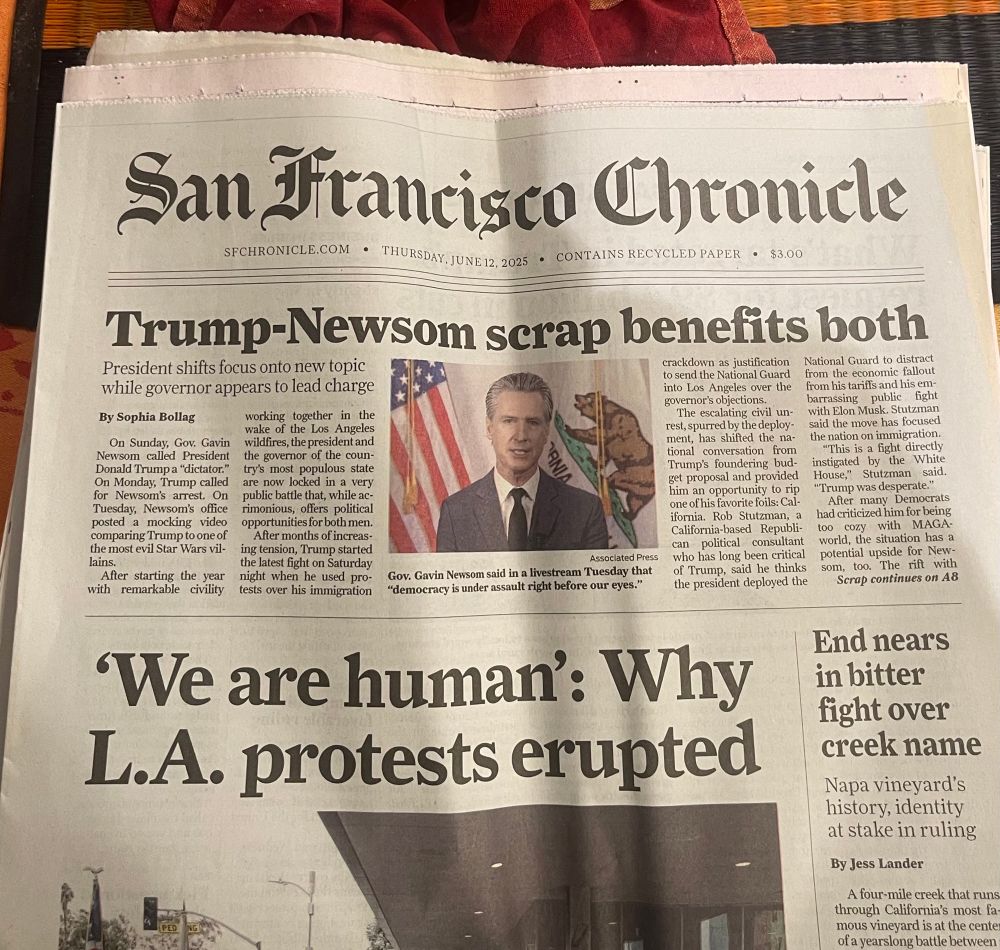 Newspaper top headline:  Trump-Newsom scrap benefits both