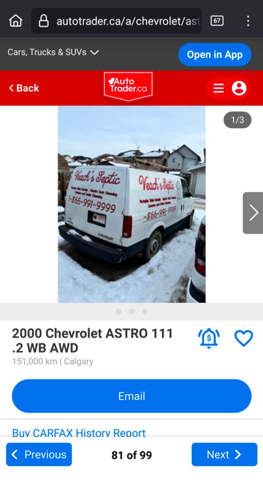it's a photo of a sales listing on the website AutoTrader. the listing shows a large white work van from a septic business.