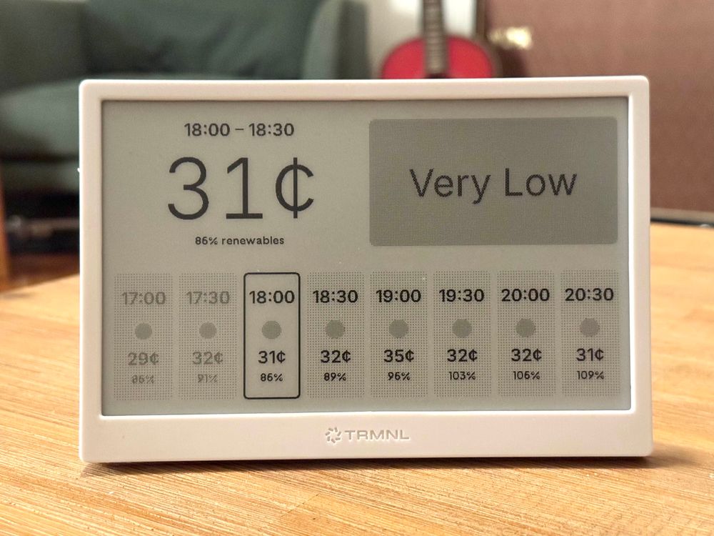 Photo of a TRMNL device showing the current electricity price for Amber Energy. 