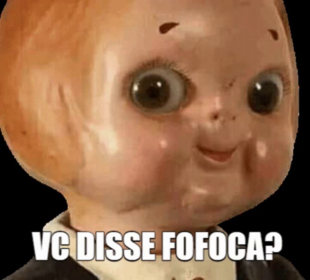 a close up of a doll 's face with the words vc disse fofoca written below it