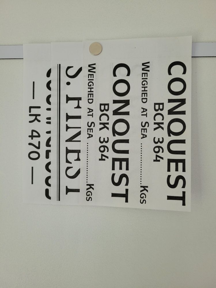 3 tickets pinned to wall