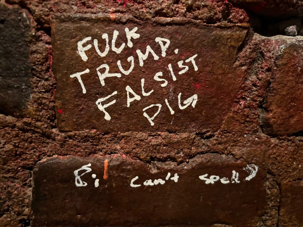 Graffiti that’s says: “Fuck Trump. Facsist pig. [I can’t spell]