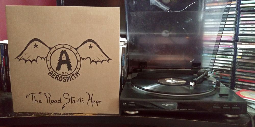 "The Road Starts Hear", an album of demo recordings by Aerosmith playing on a turntable.