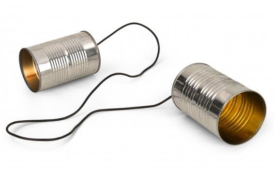 A picture of a tin can phone: two tin cans connected by a string.