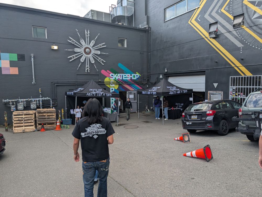 The outside of the All Together skatepark with Skate Like a Girl event tents set up.