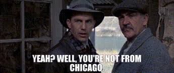 Still frame from the movie "The Untouchables" showing Kevin Costner in Sean Connery, with Costner saying "Yeah? Well, you're not from Chicago."