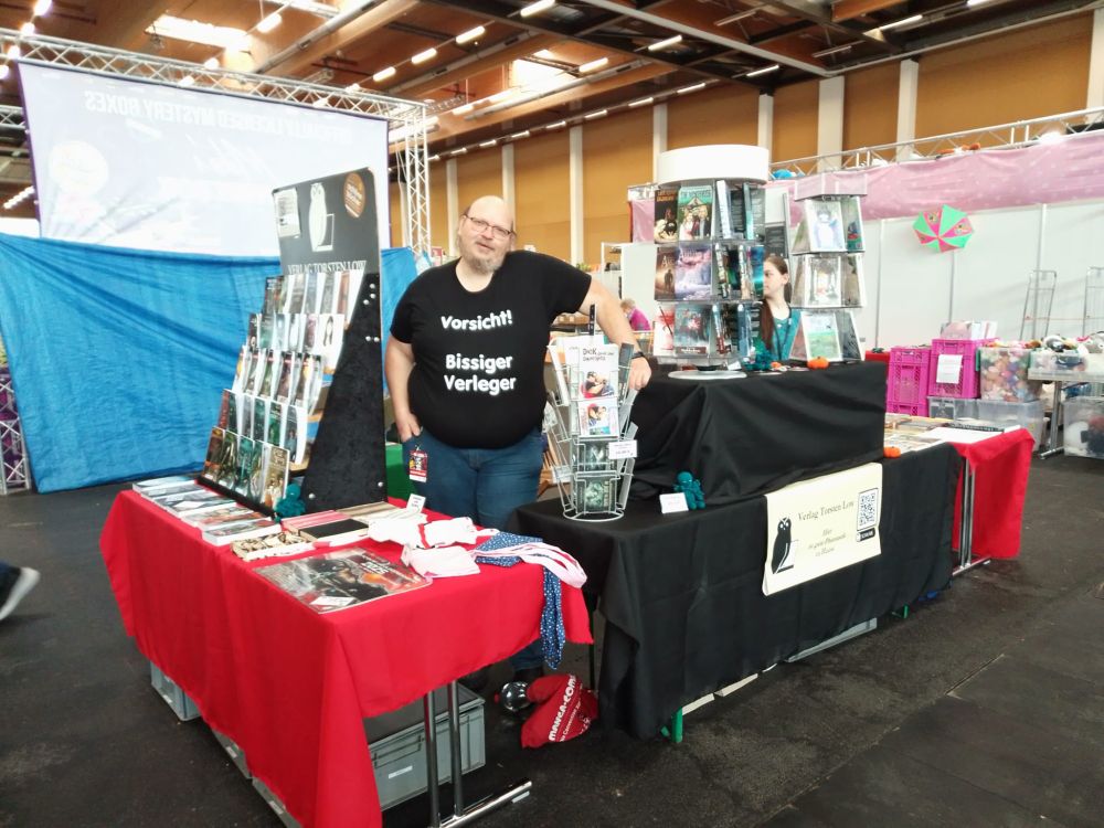 Der bissige Verleger am Stand 
