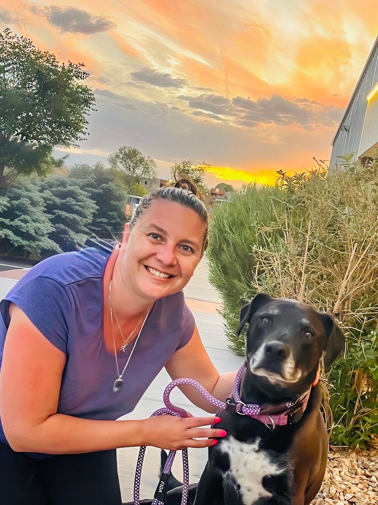 Me and my dog in front of an Albuquerque sunset 