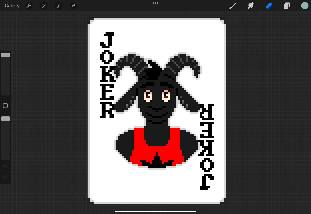 Screenshot of a drawing app on an iPad. Drawing app shows a pixel-art playing card. Playing card says ‘JOKER’ on its corners. Center of the card shows a black goat with a red tank top.