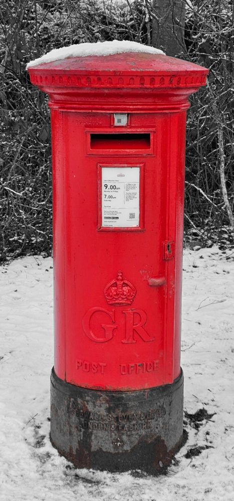 Red postbox on the day after Snowfall the previous night.