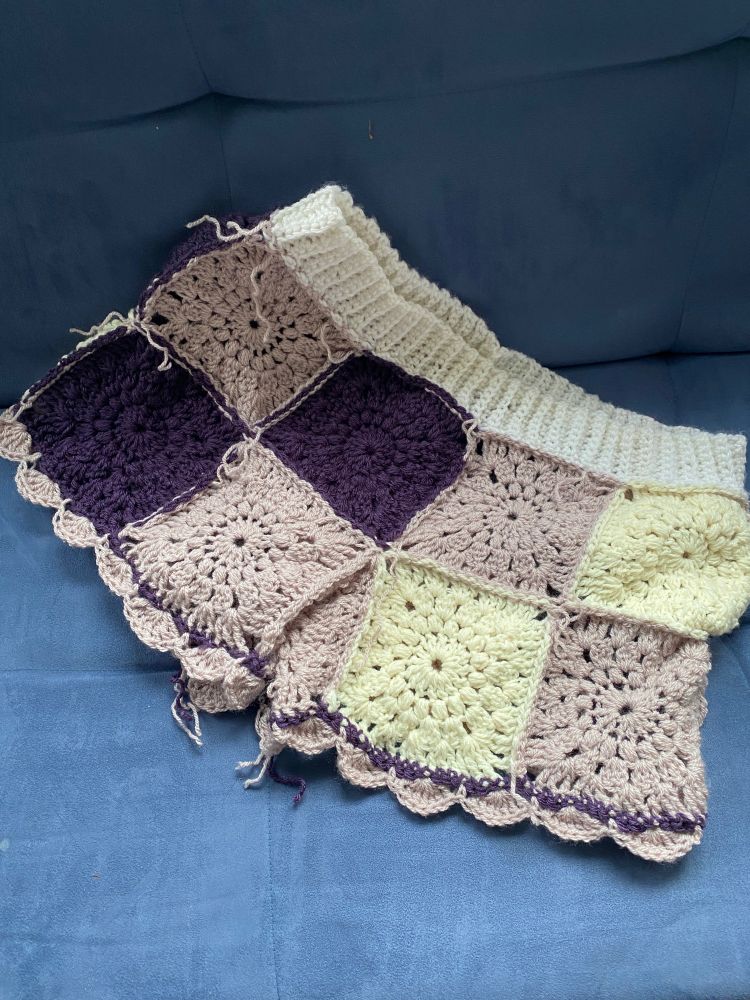 Crochet shorts on a blue couch