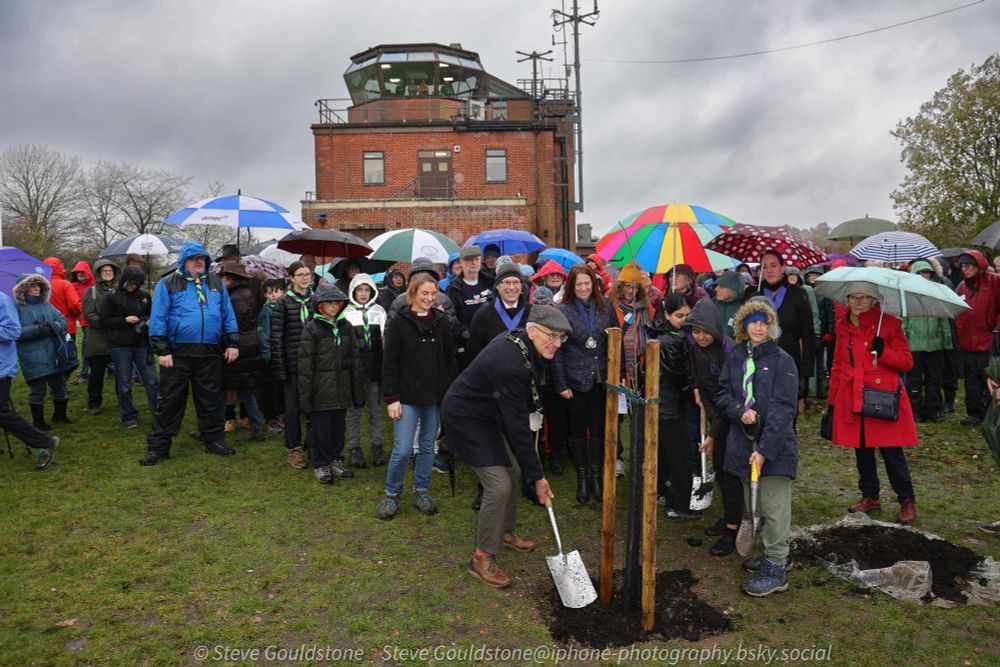 https://en.wikipedia.org/wiki/Sycamore_Gap_tree

Planting of one of the saplings from the illegally cut down iconic tree. 
