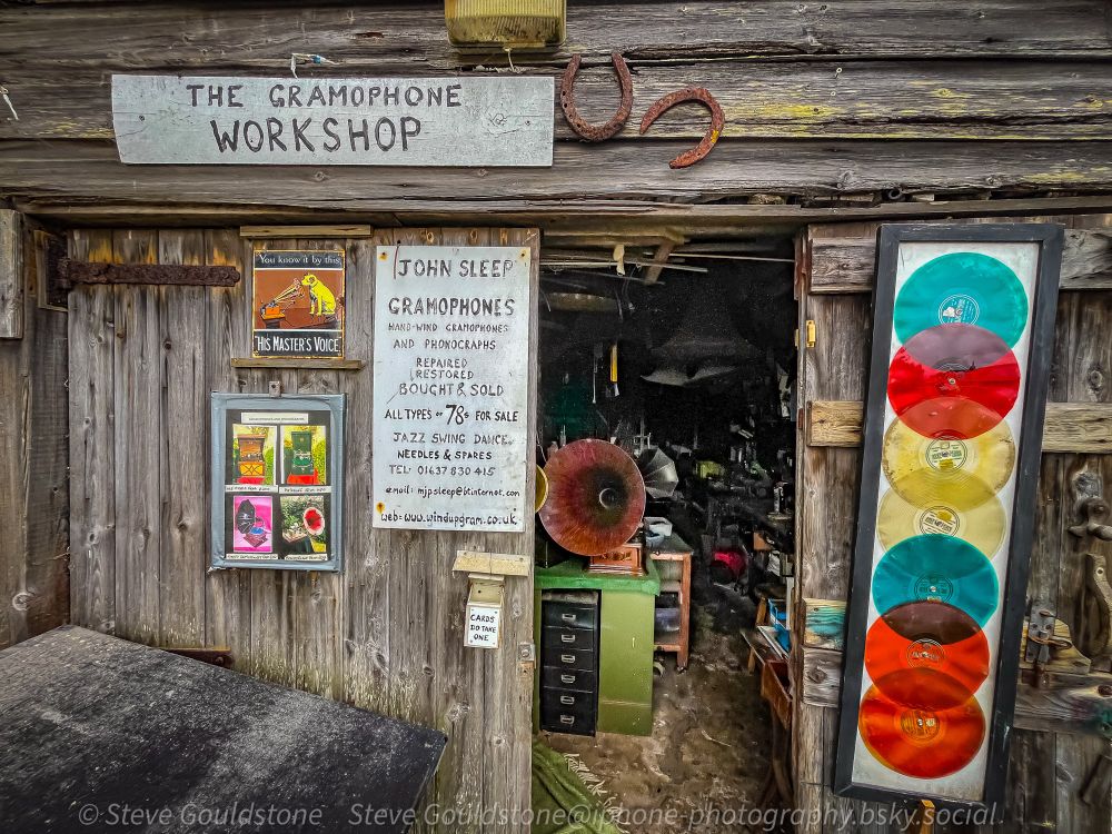 External door and signs to a gramophone workshop.