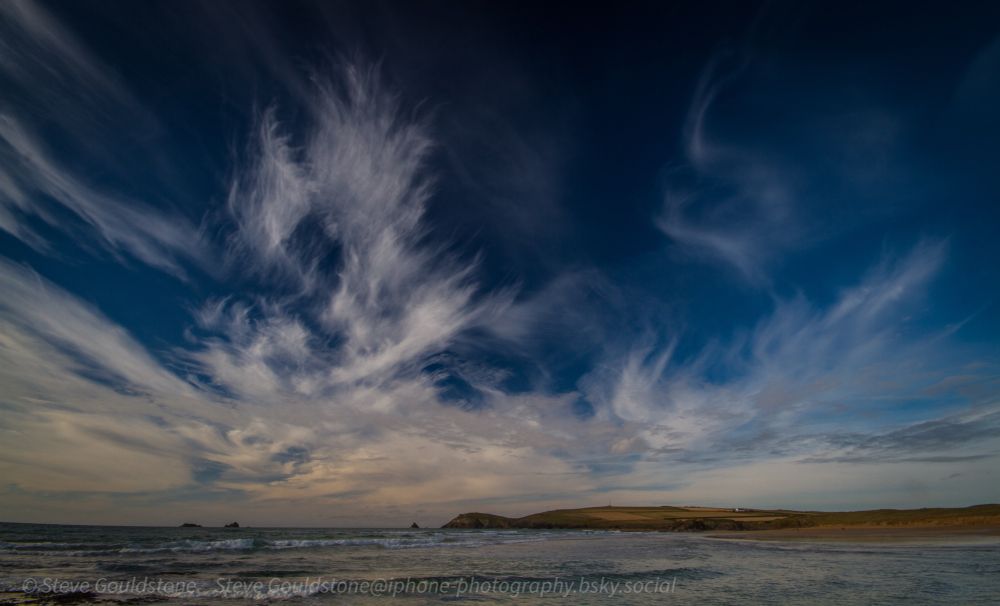 Awesome towering whisky cloud forms spectacular shapes over the coast at Constantine Bay, Cornwall. 