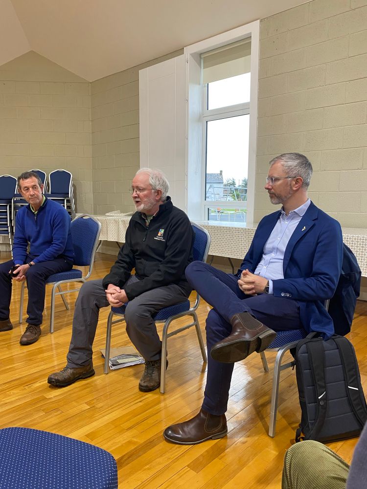 Image of Roderic O’Gorman and Malcolm Noonan speaking to the campaign group. 