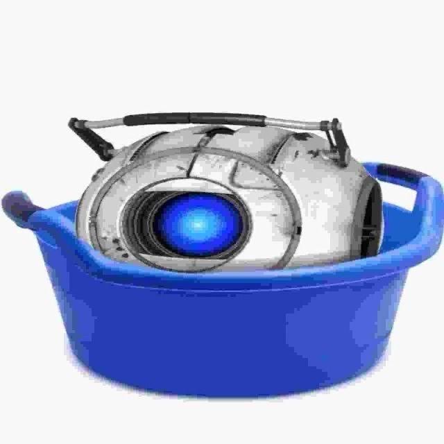 An image of Wheatley from the game Portal 2 in a blue compressed bucket against a white background. The image is slightly squished.  
