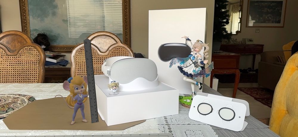Barbara, Chibi Barbara, and Gadget pose next to the displayed Apple Vision Pro and Zeiss lenses