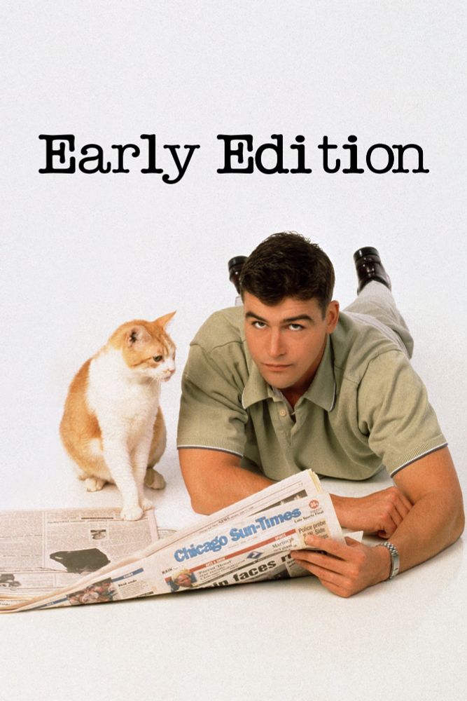 Early Edition - Kyle Chandler and the cat laying on the floor reading a copy of the Chicago Sun-Times.