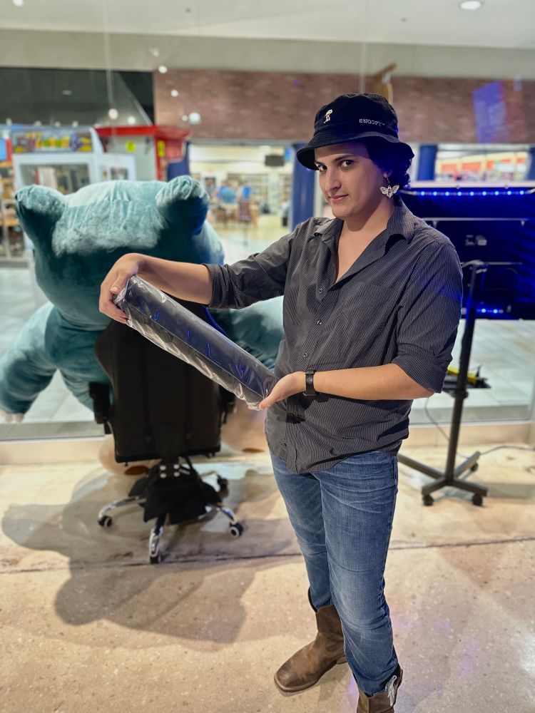 Fafestuff poses with Drop deskmat