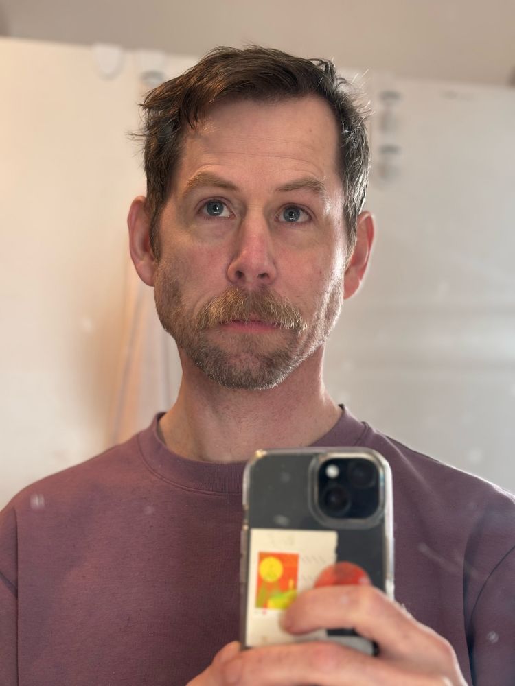 Mirror selfie featuring a big dumb moustache