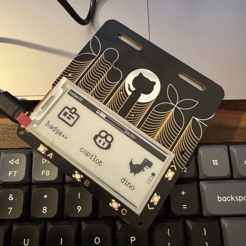 The GitHub badge 2024 with a rp2350 and eInk display, shown the last state of BadgerOS.