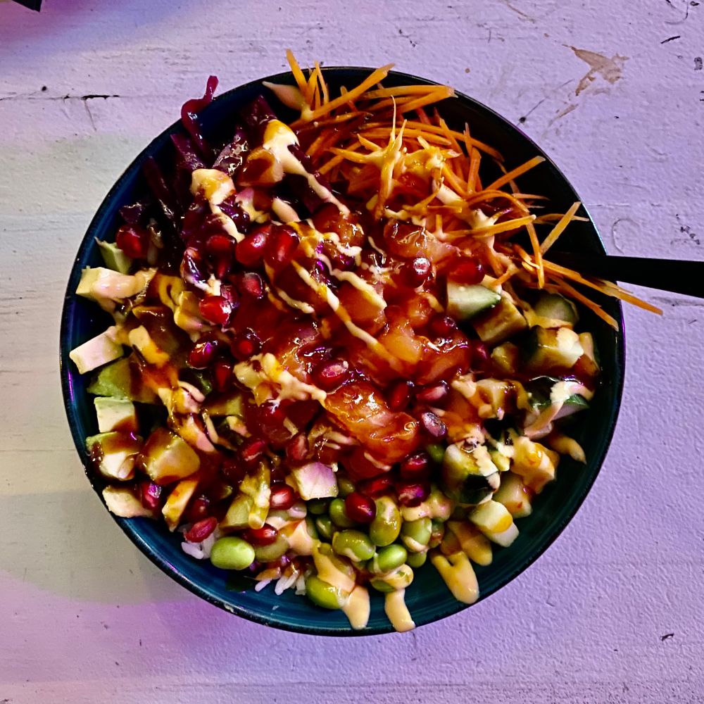 Salmon bowl with edamame, salmon, carrots and plenty of other yummie stuff.