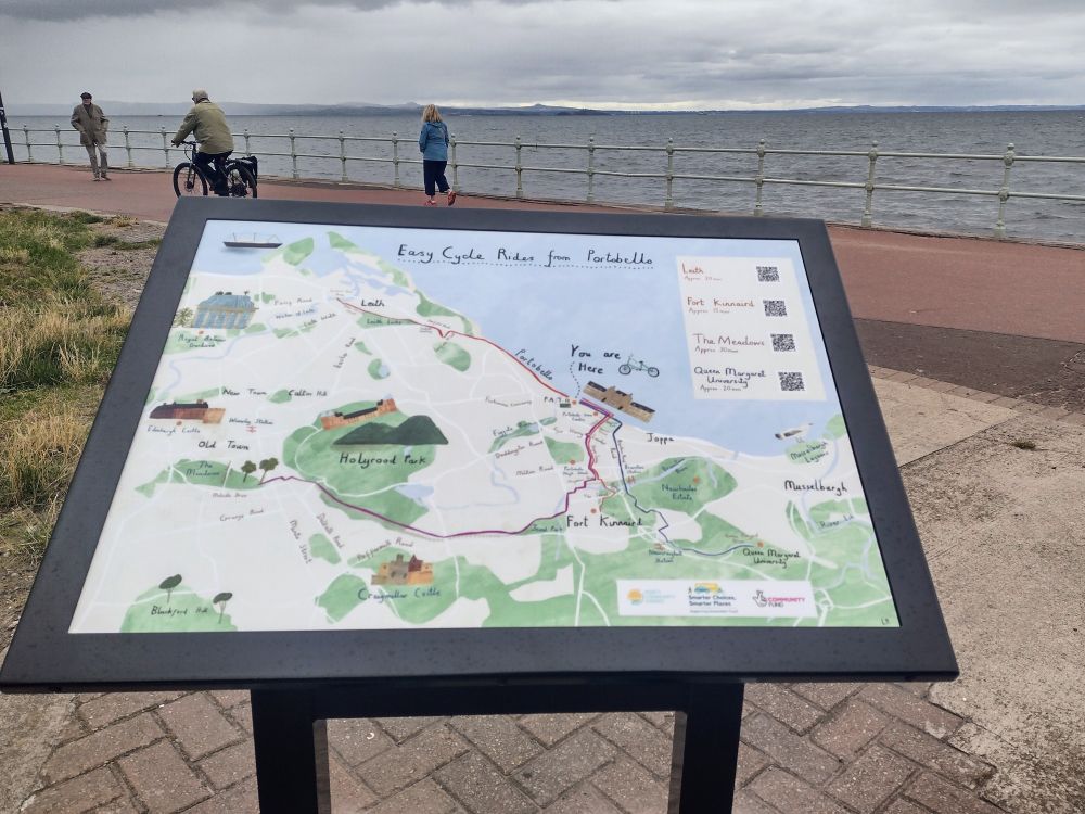 Display board on Portobello prom with custom map showing some easy cycle routes starting at the board.