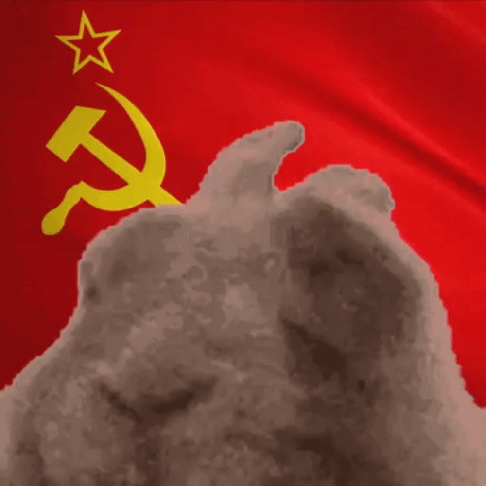 a hammer and sickle on a red background with a star above it