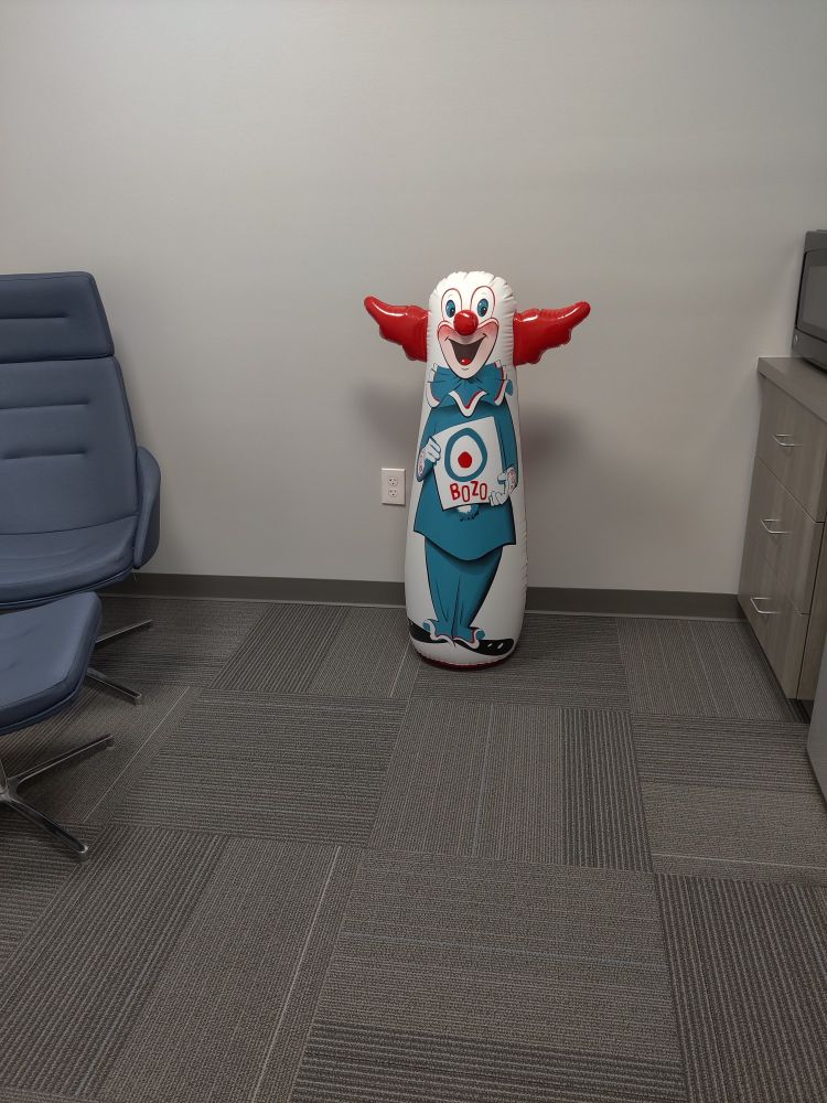 Inflatable Bozo the clown at my office. Who knows, I sure as fuck don't. He haunts me.