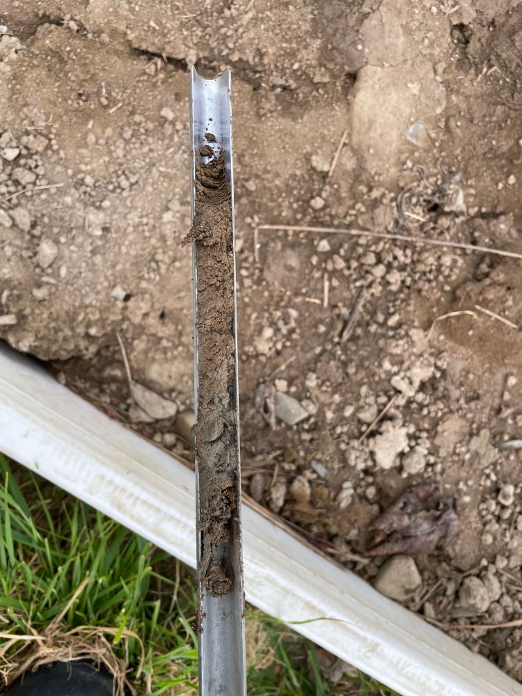 Picture of a 10 cm soil core with some interesting colour variation depending on depth