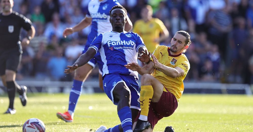Bristol Rovers midfielder Kamil Conteh challenges for the ball during a game