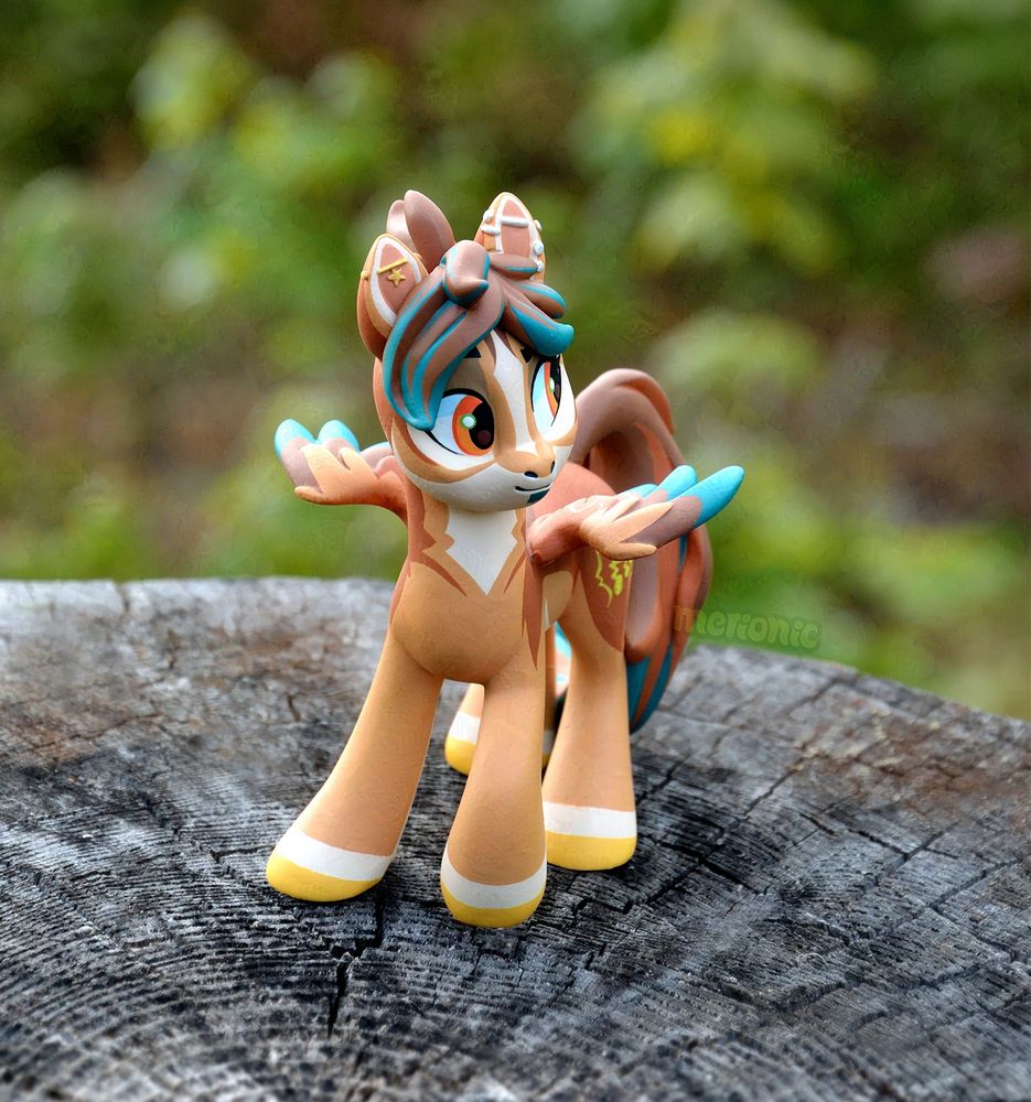 A handmade figurine of a pegasus character.