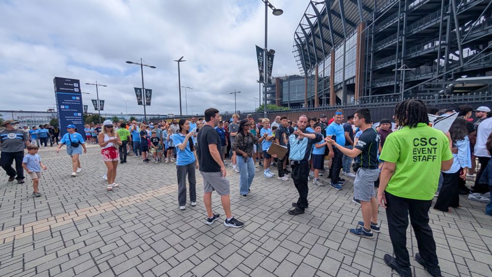 Lines of fans waiting to get inside a stadium at the FIFA Club World Cup 