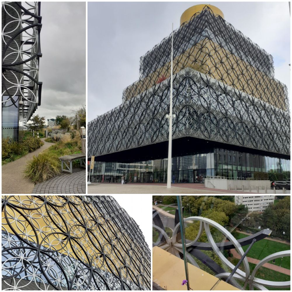 Views of the exterior of the library of Birmingham. Modern facade decorated with interconnected metal circles. 