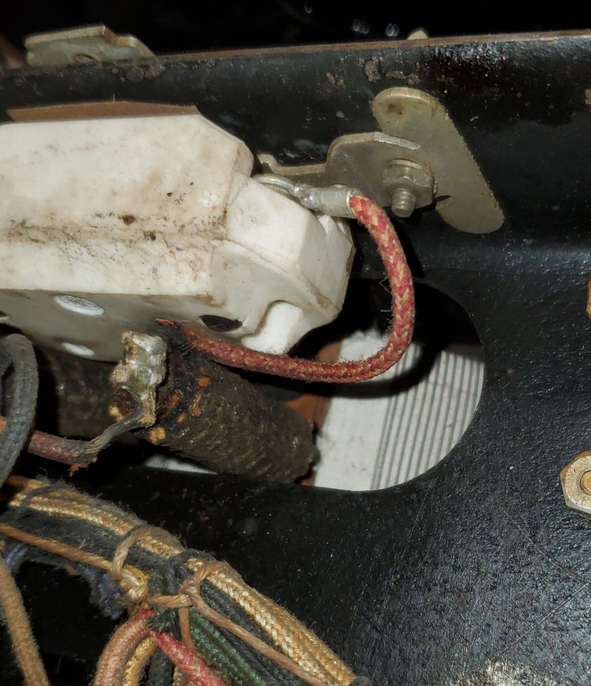 A view of the AC line switch and part of the AC line adjustment rheostat of the power supply