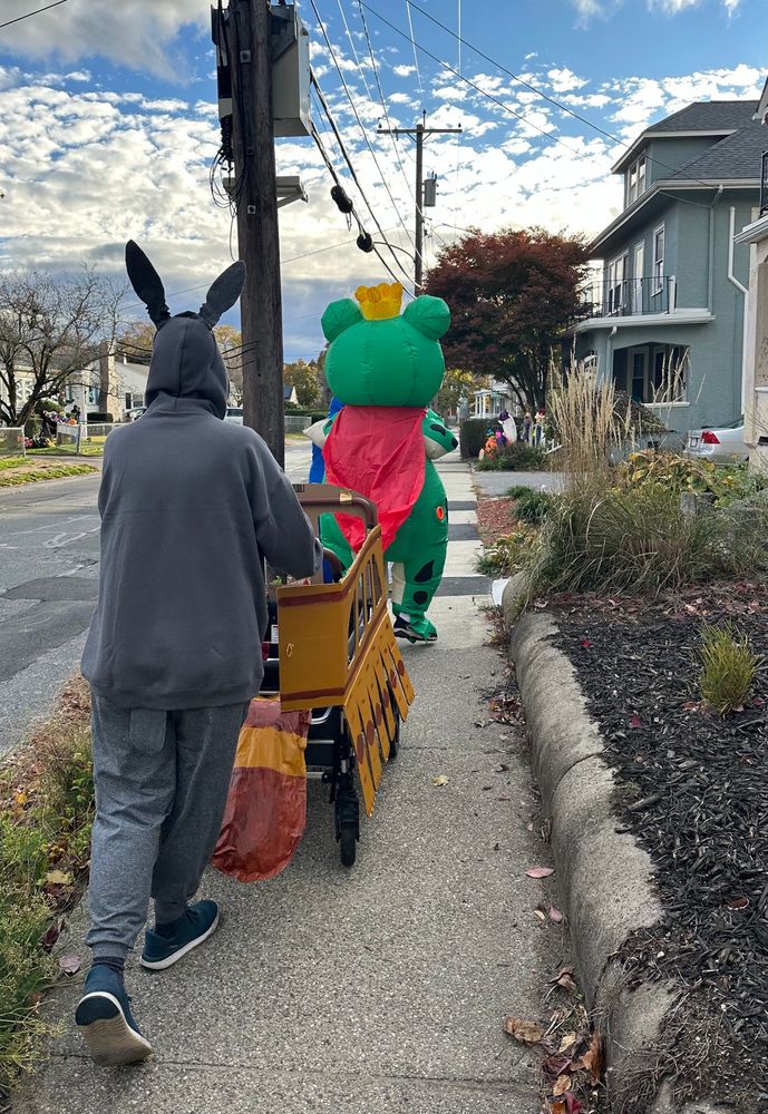 From behind a Totoro and a giant inflatable frog head home to hand out candy. 