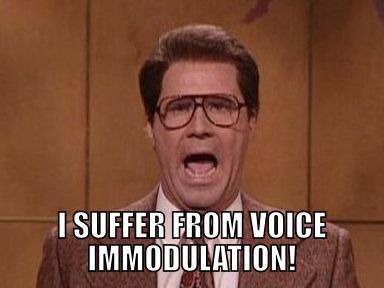“I SUFFER FROM VOICE IMMODULATION!” SNL sketch with Will Ferrell in glasses and a brown sport coat