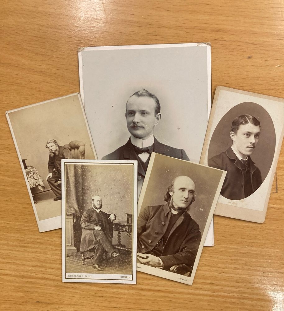 Four carte de visite and one cabinet card of middle-Irish men with a range of haircuts, moustaches, whiskers, and beards.