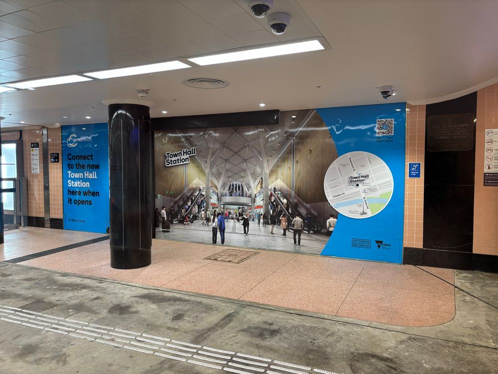 Wall with a mock design of the Town Hall station yet to be opened